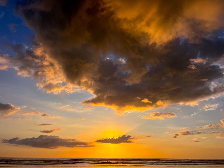 a clear picture of a beach with blue sky